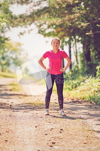 Image of woman enjoying in a healthy lifestyle while jogging