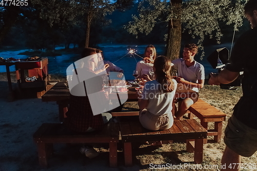 Image of french dinner party on summer