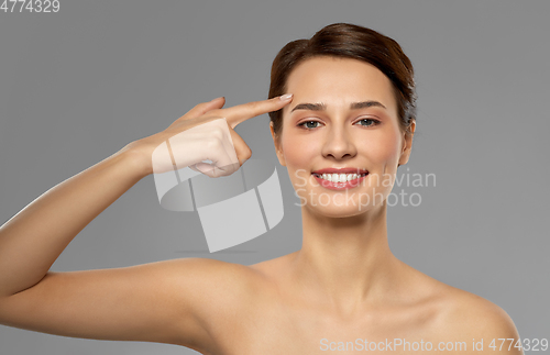 Image of beautiful young woman with bare shoulder