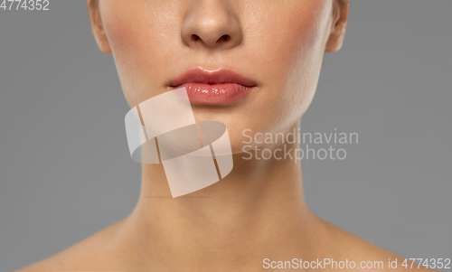 Image of close up of beautiful young woman face and neck