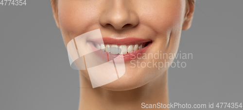 Image of close up of beautiful young woman with white smile