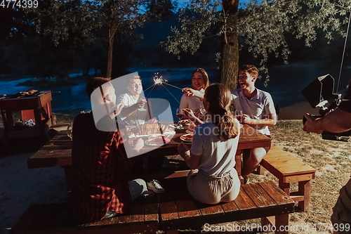 Image of french dinner party on summer