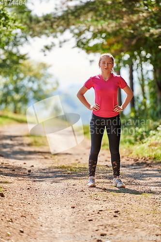 Image of woman enjoying in a healthy lifestyle while jogging