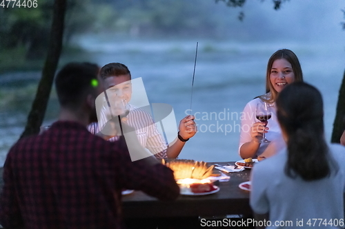 Image of french dinner party on summer