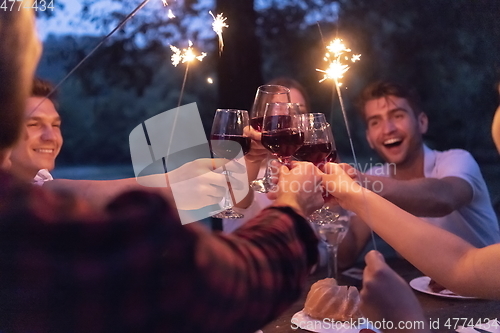 Image of french dinner party on summer