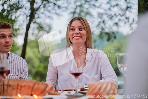 Image of french dinner party on summer