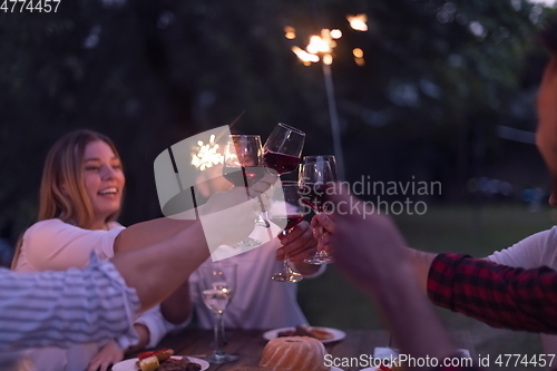 Image of french dinner party on summer