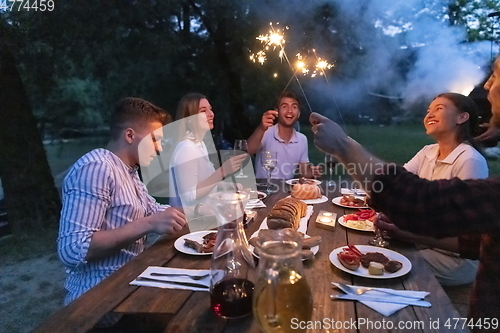 Image of french dinner party on summer