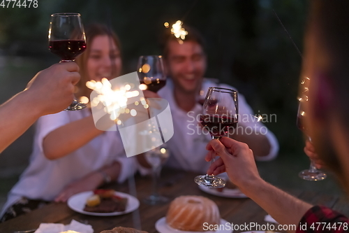 Image of french dinner party on summer