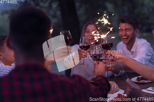 Image of french dinner party on summer