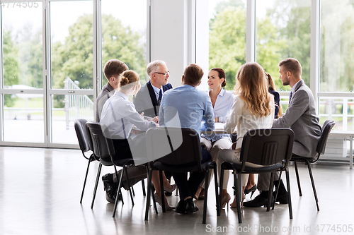 Image of business team meeting at office