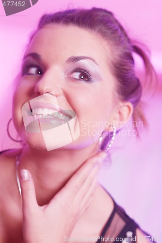 Image of A laughing happy dark hair girl