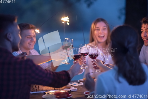 Image of french dinner party on summer