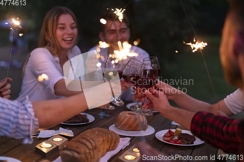 Image of french dinner party on summer