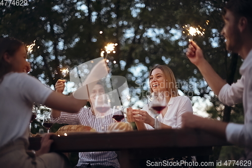 Image of french dinner party on summer