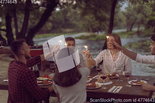 Image of french dinner party on summer