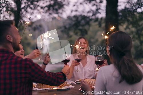 Image of french dinner party on summer