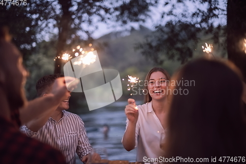 Image of french dinner party on summer