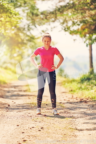 Image of woman enjoying in a healthy lifestyle while jogging