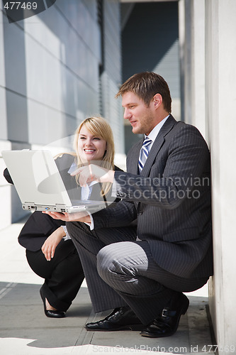 Image of Working caucasian business people