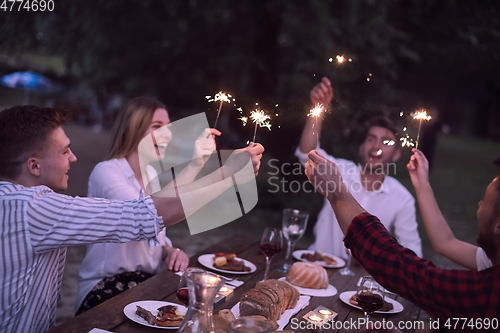 Image of french dinner party on summer