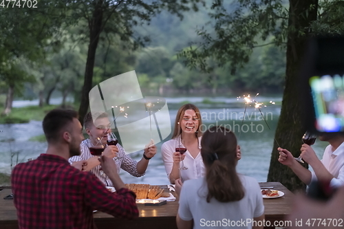 Image of french dinner party on summer