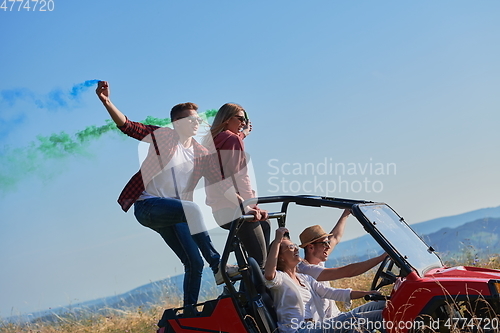 Image of  colorful torches while driving a off road buggy car