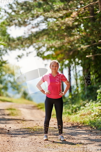 Image of woman enjoying in a healthy lifestyle while jogging