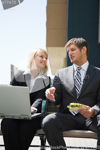 Image of Caucasian business people having discussion