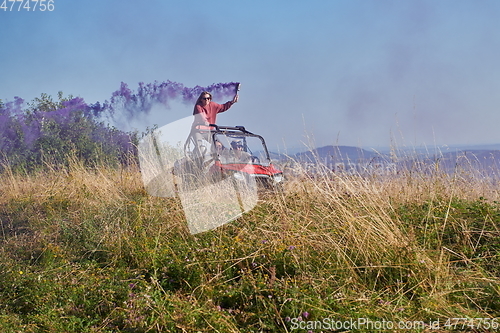 Image of  colorful torches while driving a off road buggy car