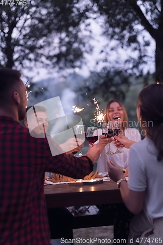 Image of french dinner party on summer