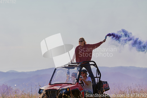 Image of  colorful torches while driving a off road buggy car