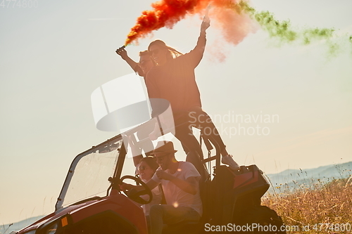 Image of  colorful torches while driving a off road buggy car