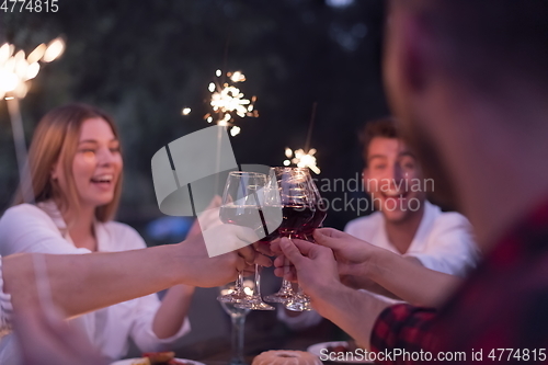 Image of french dinner party on summer