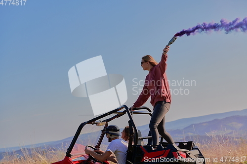 Image of  colorful torches while driving a off road buggy car