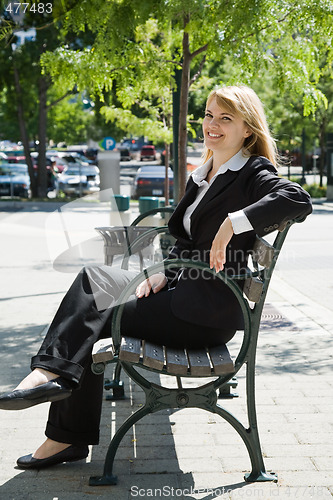 Image of Caucasian businesswoman outdoor