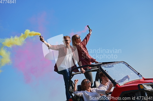 Image of  colorful torches while driving a off road buggy car