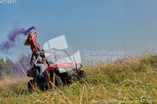 Image of  colorful torches while driving a off road buggy car