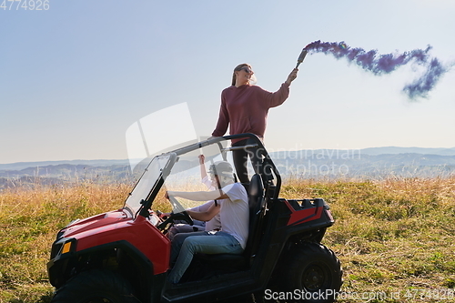 Image of  colorful torches while driving a off road buggy car