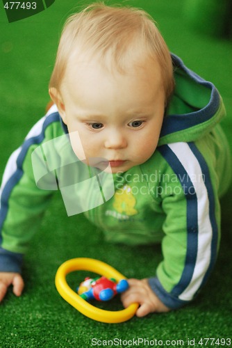 Image of Child with a toy