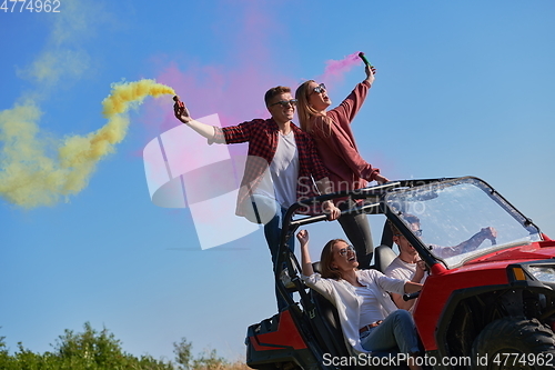 Image of  colorful torches while driving a off road buggy car