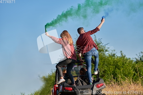 Image of  colorful torches while driving a off road buggy car