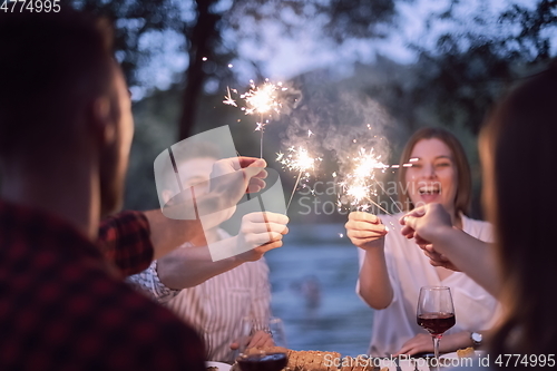 Image of french dinner party on summer