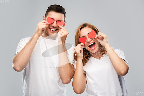 Image of happy couple with red hearts instead of eyes