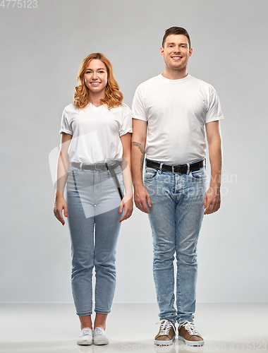 Image of happy couple in white t-shirts