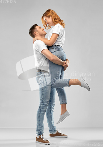 Image of happy couple in white t-shirts