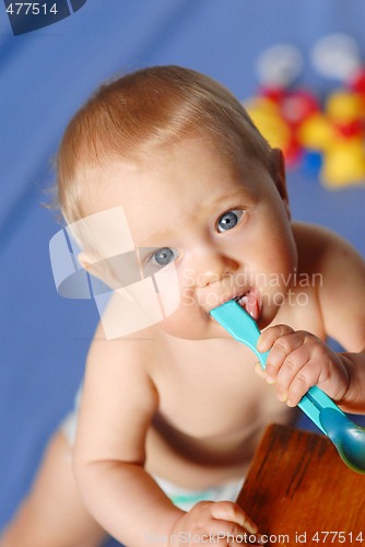 Image of Baby with spoon