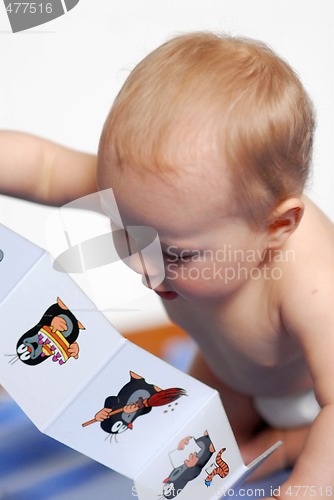 Image of Baby with book