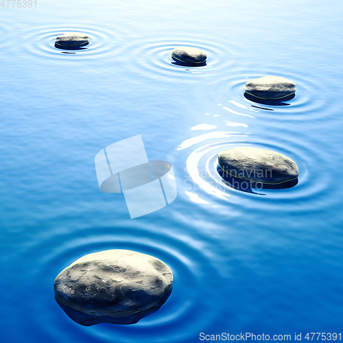 Image of pebble stones in water with ripples background