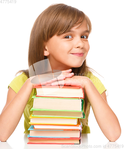 Image of Little girl with her books